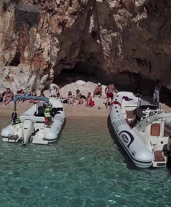 People Sunbathing on Grama Bay